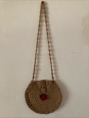 Handwoven Round Straw Crossbody Jute Bag in Brown with Red Rose Motif
